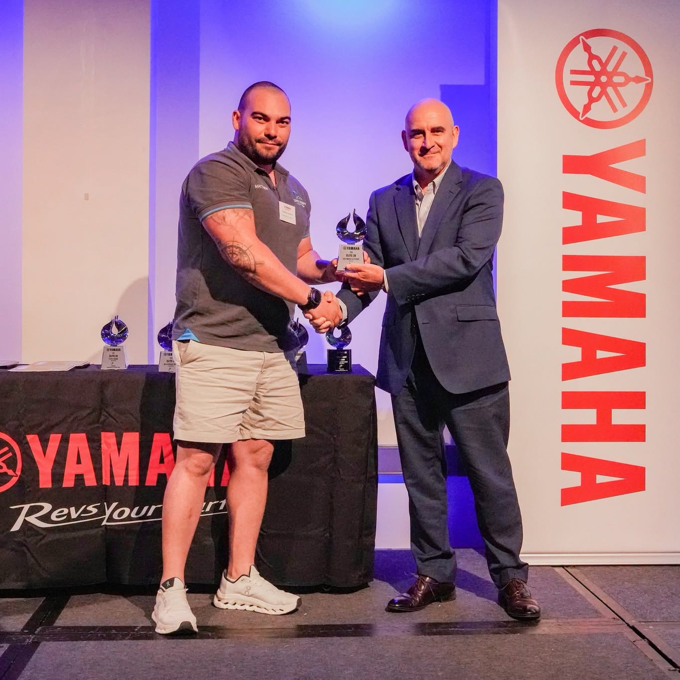 Cavs Marine receiving an award as an elite 20 Yamaha dealer
